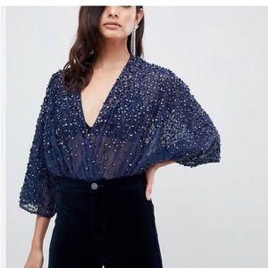 Sequin bodysuit. Never worn.